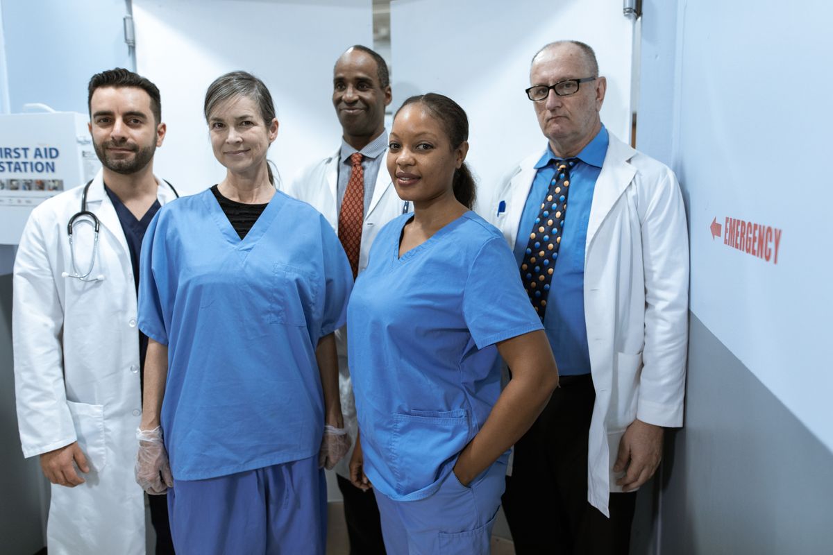 A diverse group of care and support professionals