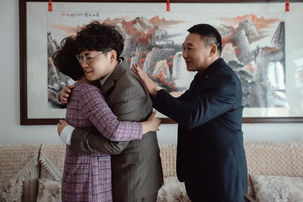 A family sharing a warm, supportive moment together