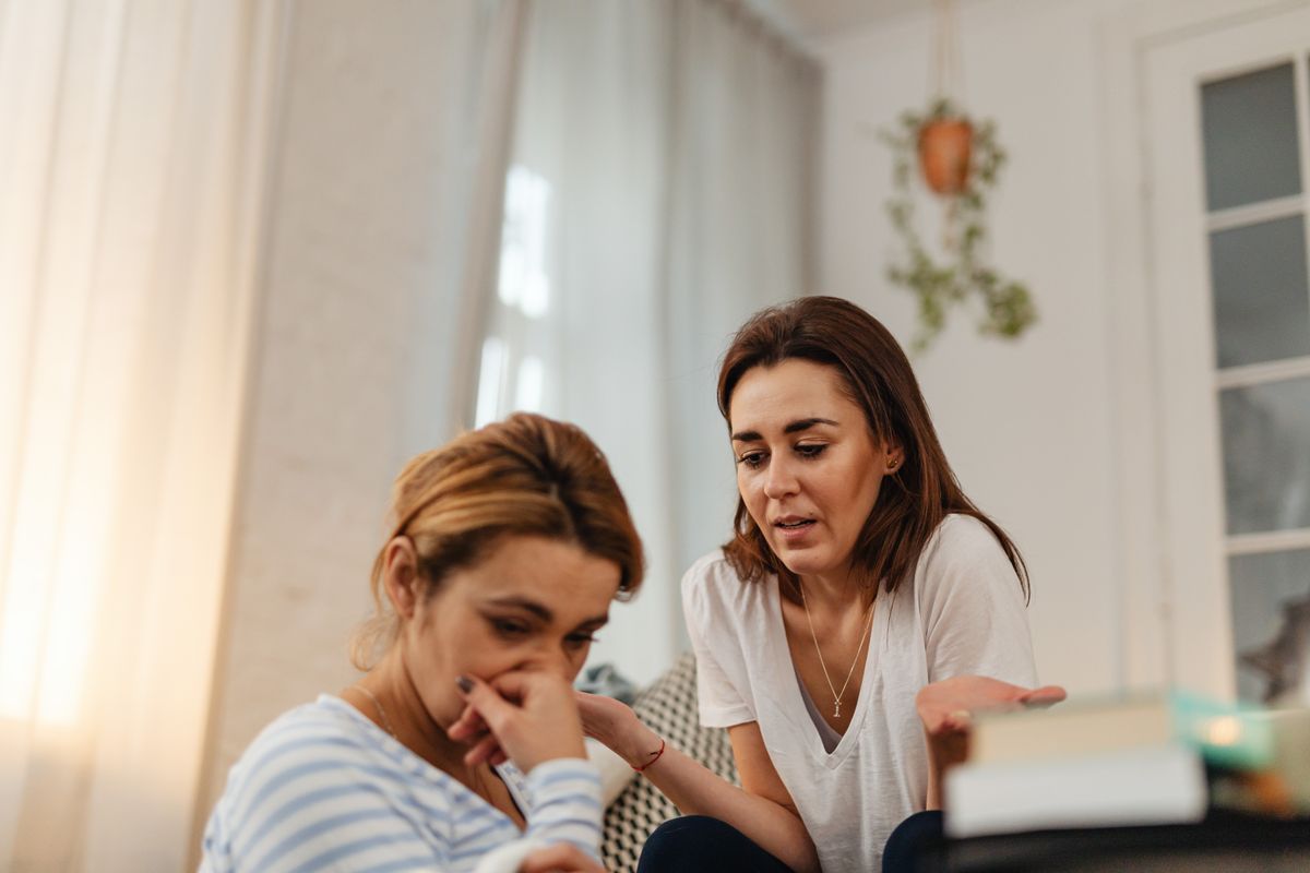Two people sharing a supportive, compassionate conversation